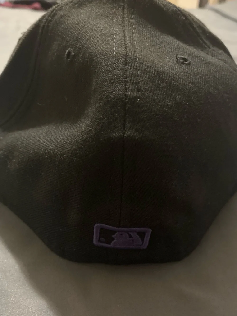 Black Baseball Cap with Purple Embroidered MLB Logo